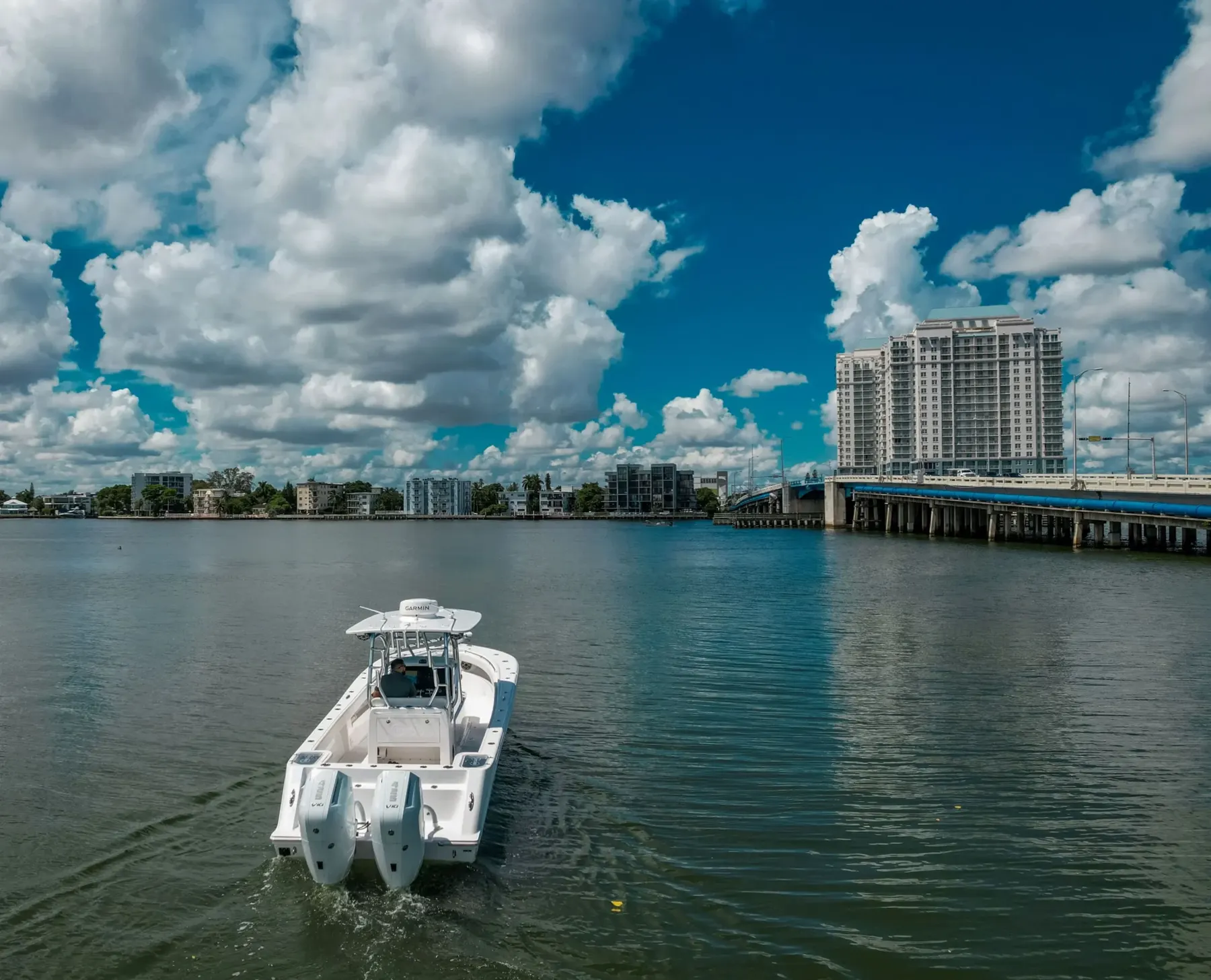 Limitless 320 cruising past the Miami skyline